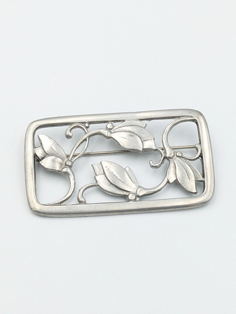 Vintage modernist open metalwork floral rectangle brooch pin